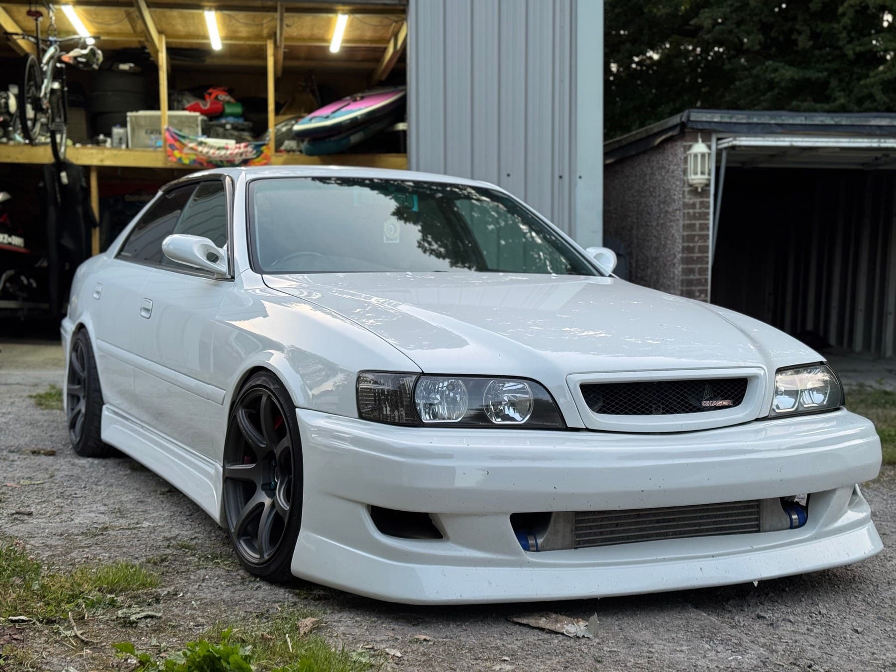 A 1999 Toyota Chaser JZX100 — the kind of car crossing the 25-year line right now.