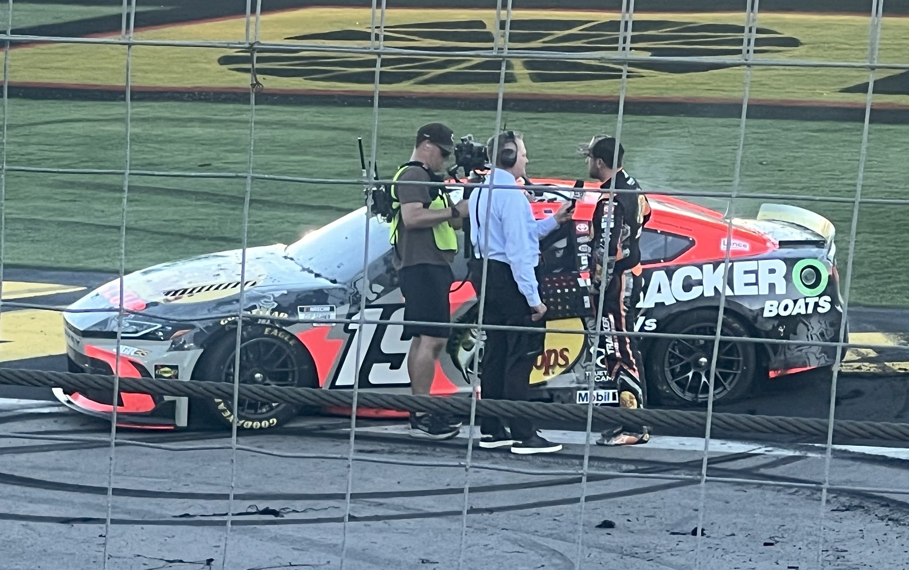 A television crew interviews Briscoe on the frontstretch after the South Point 400.