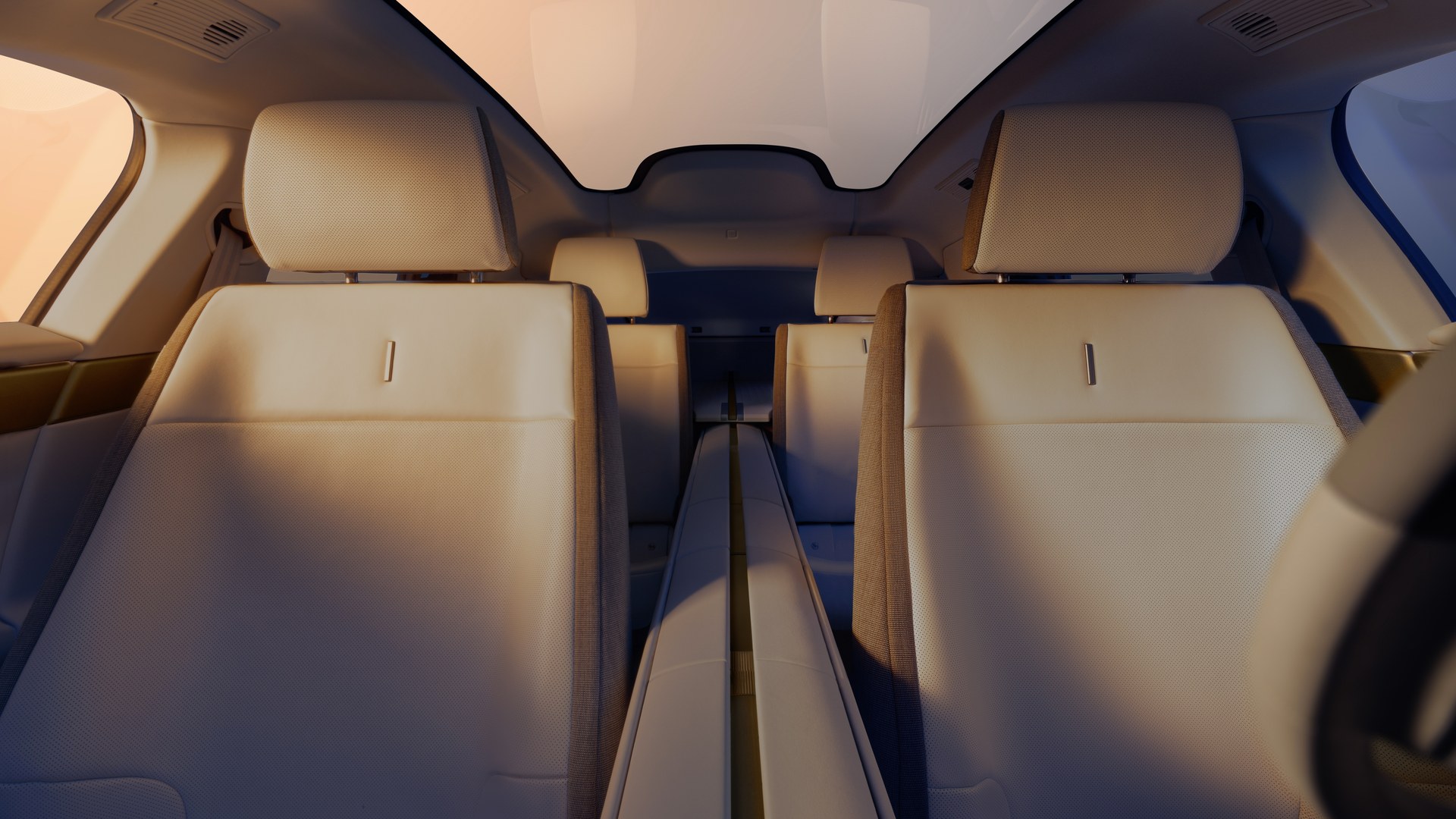 Four individual seats, each with its own armrest, split by the central spine that runs the full length of the cabin. Jaguar calls the Type 01 a strict four-seater by choice.