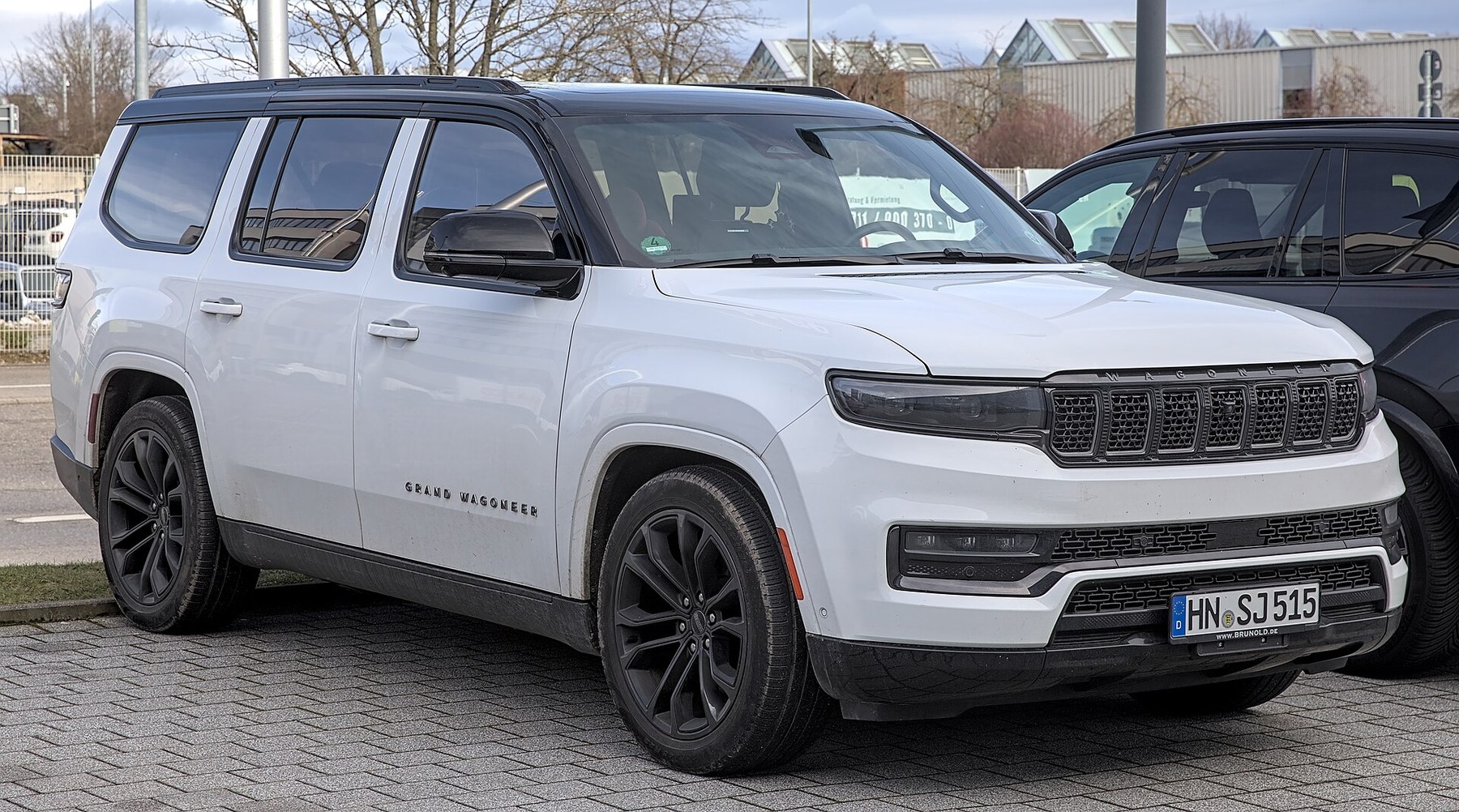 A Jeep Grand Wagoneer (WS). Grand Wagoneer accounts for 22,144 of the 97,349 trucks in the campaign, built between 24 February 2021 and 30 October 2025 — the single largest model line in the recall after the standard Wagoneer.