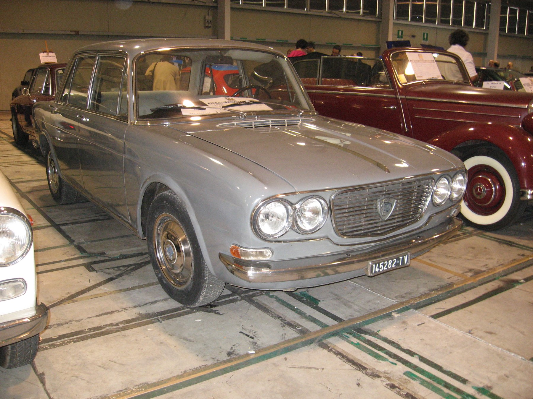 A Flavia 1.8 berlina of the second series at Auto e Moto d'Epoca in Padova — the quad headlights and shield grille mark out the 1967-on 819 reskin. The same model featured in this story, not the actual car.
