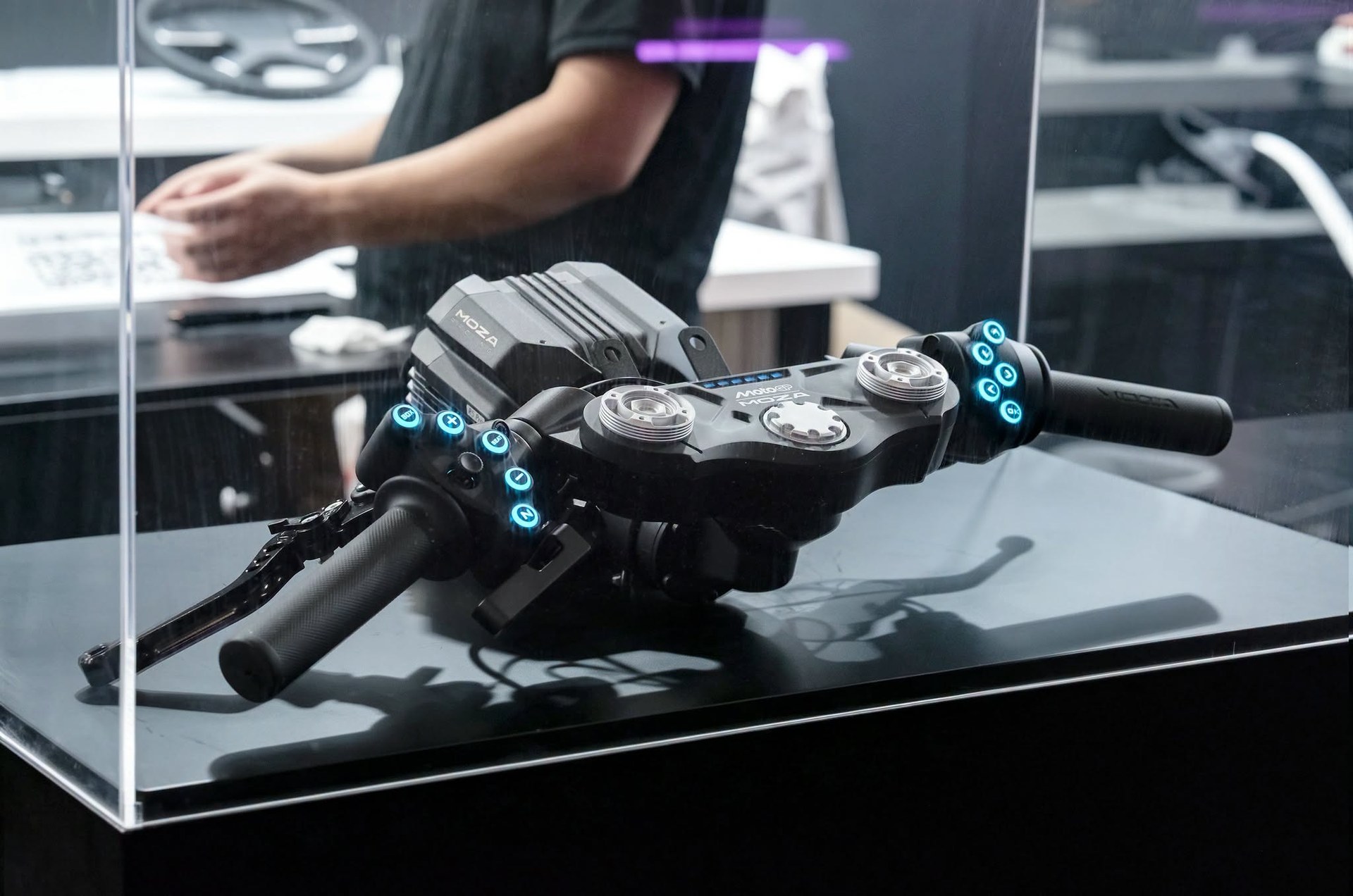 MOZA Brought Four Licensed Wheels to Gamescom. The Thing Worth Watching Was the Handlebar.