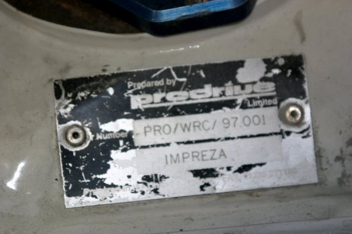The chassis plate from a genuine 1997 Prodrive-built Subaru Impreza WRC car — the exact team credited with popularizing the "Rocket" anti-lag system.