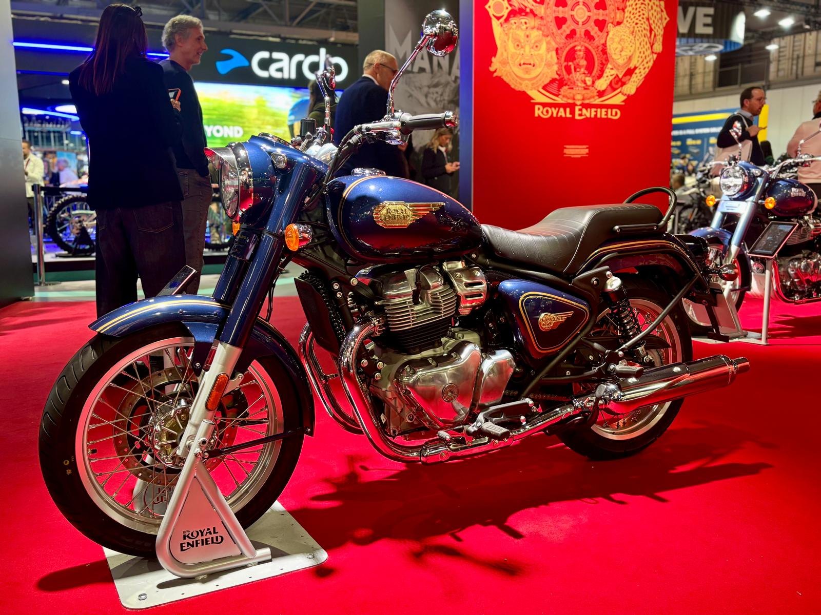 The same bike in blue, on Royal Enfield's stand at the model's show debut. Other markets get a blue option; North America and Europe are Cannon Black only, with gold lining and a 3D tank badge.