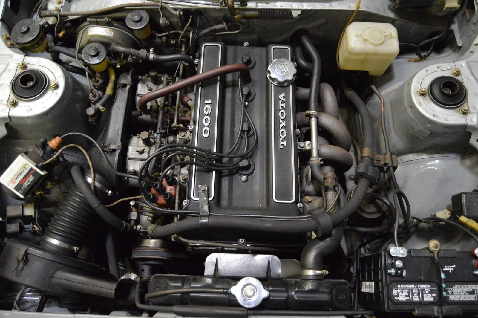 The twin-cam 2T-G, still wearing its original 40mm Mikuni Solex carburetors — the engine the US-spec Celica never got.