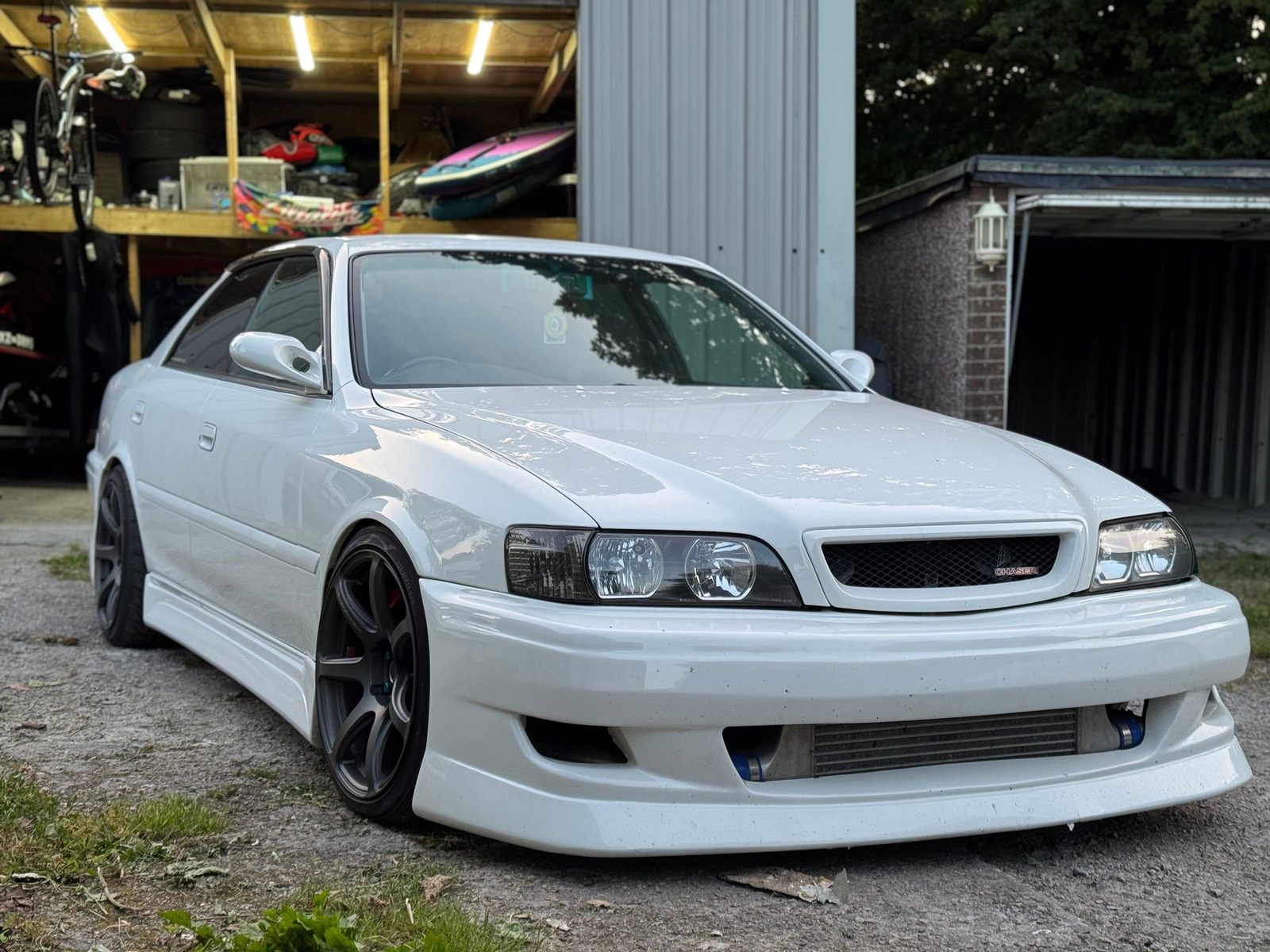 A 1999 Toyota Chaser JZX100 — the kind of car crossing the 25-year line right now.